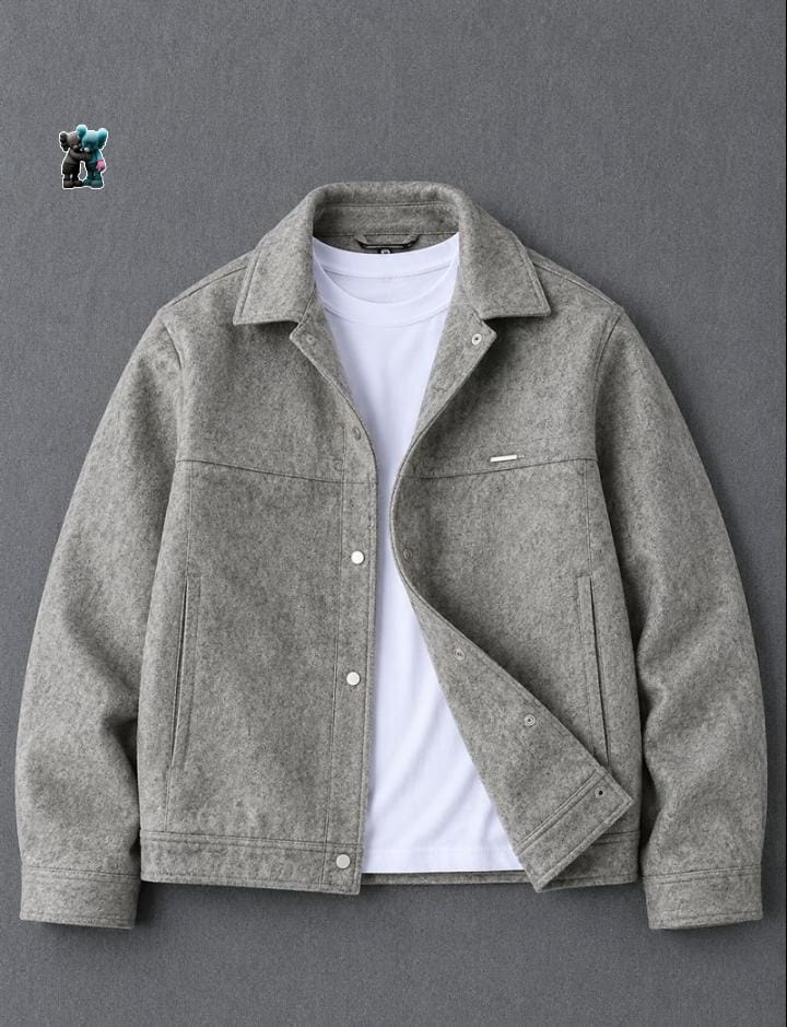 Gray button-up jacket worn open over a white t-shirt.
