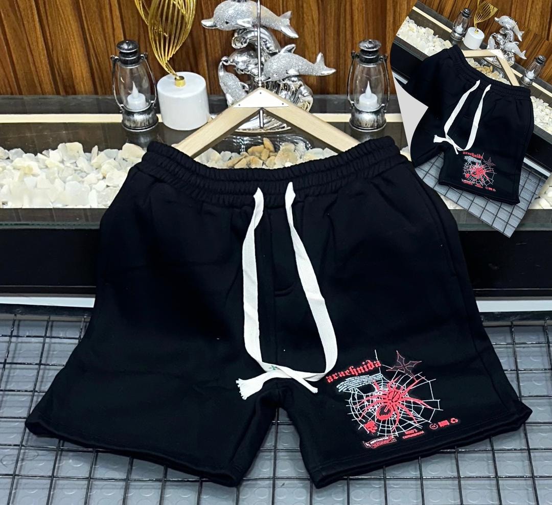 Black short joggers with red arachnida spider and web embroidery on the leg.