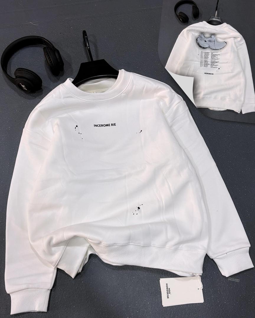 White crewneck sweatshirt with Incerome Rie ink splash details.