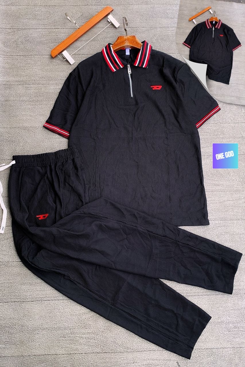 Black ribbed two-piece set with striped collar and red logo.