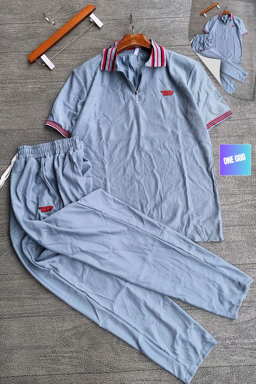 Light blue ribbed two-piece set with striped collar and red logo.