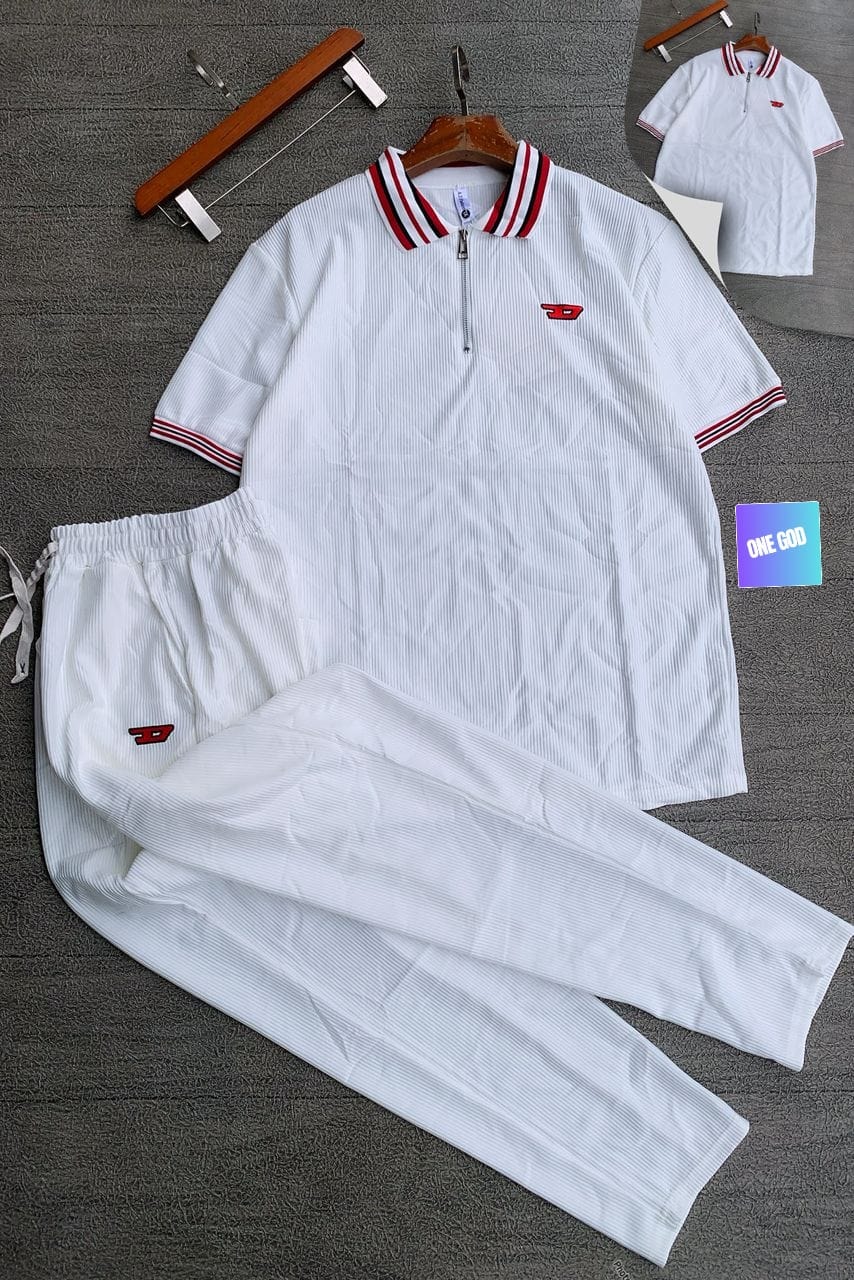 White ribbed two-piece set with striped collar and red logo.
