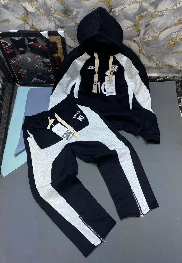 Black colorblock 16 crest hooded tracksuit with pants.