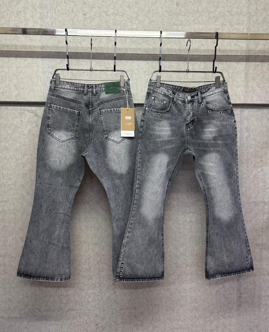 Two pairs of gray flared jeans shown from back with different washes and pocket details.
