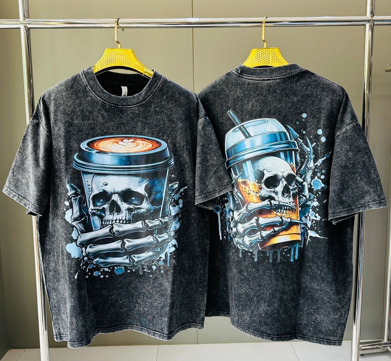 Stone wash t-shirt with skull in coffee cup graphic on front and skeleton skull drinking on back.