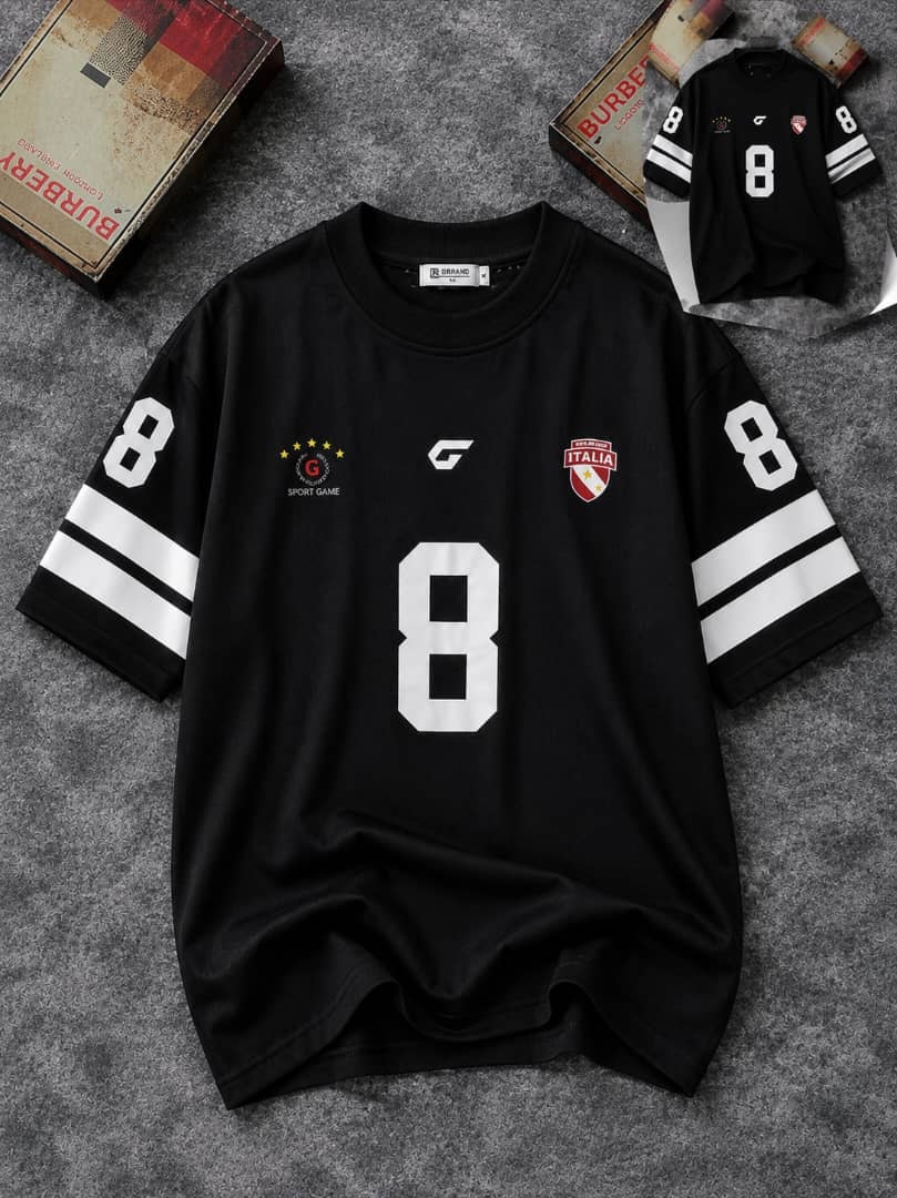 Black sports jersey with large white 8 on chest and sleeves plus various logos, shown flat with small inset view.
