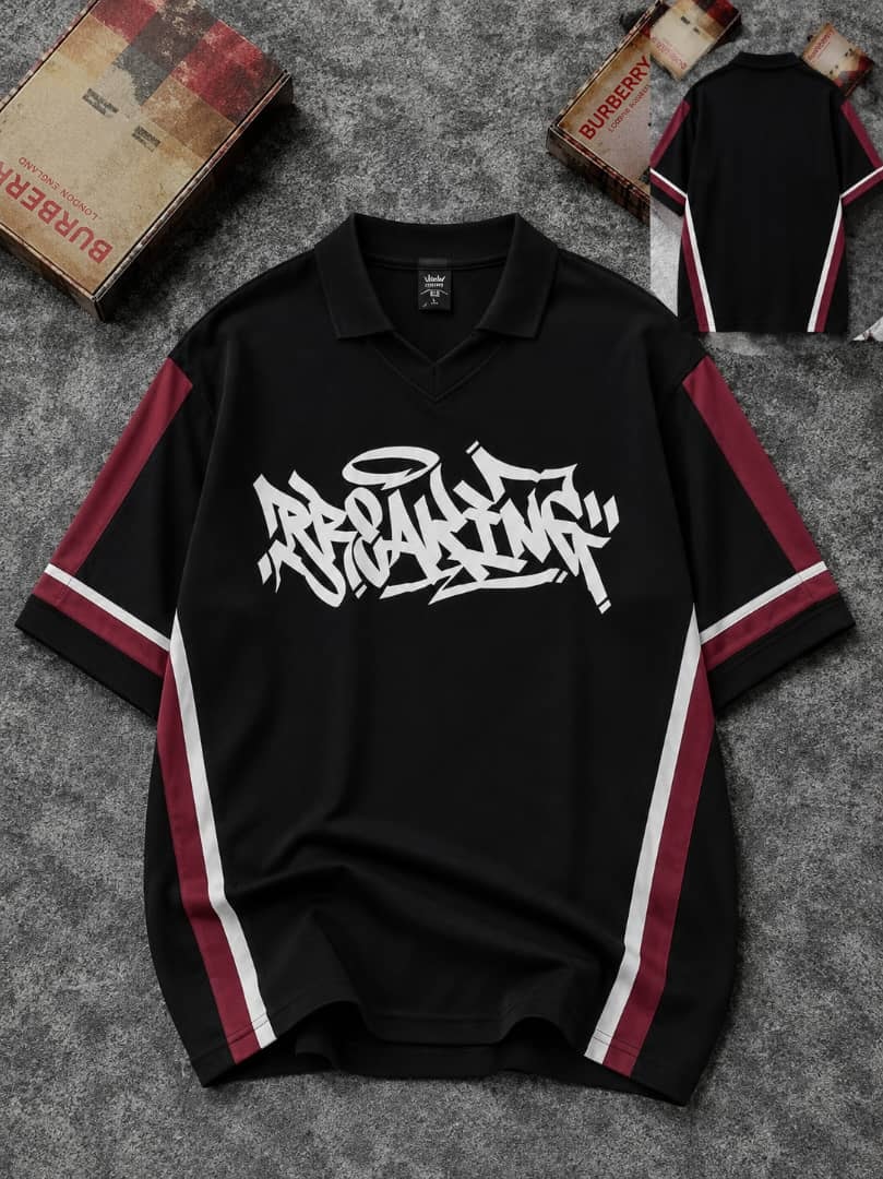 Black polo jersey with white graffiti graphic on chest and maroon white striped sleeves, shown flat with back view inset.