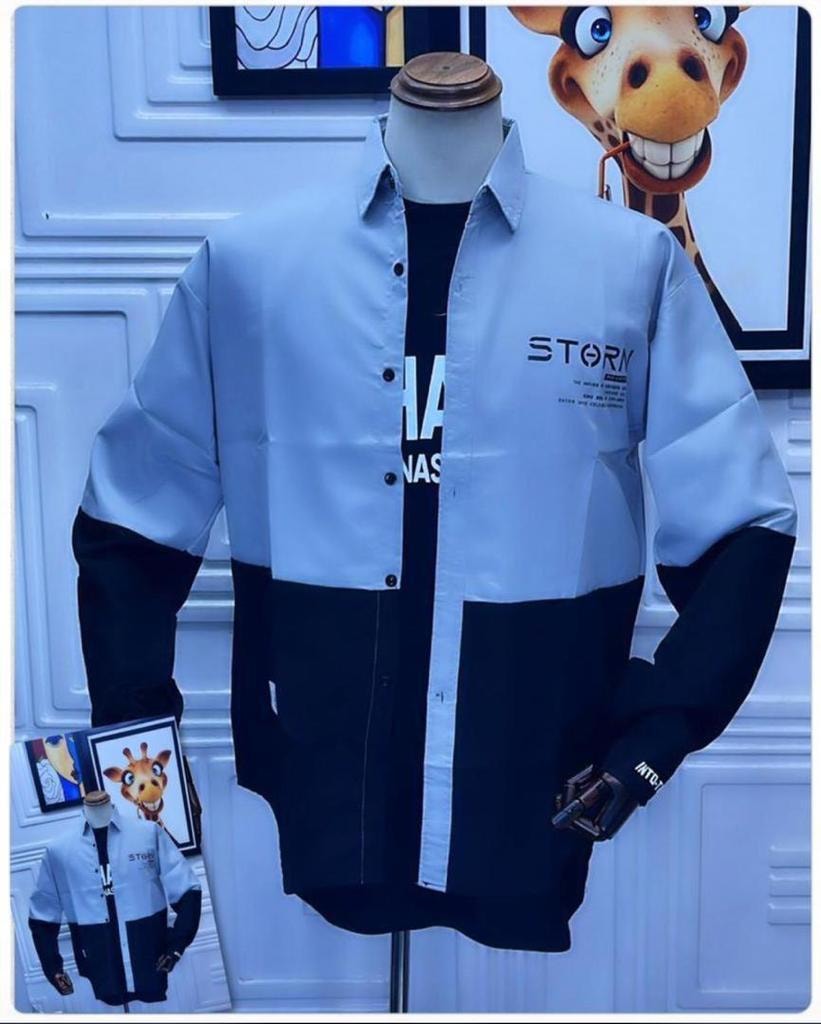 Light blue and black colorblock button-down shirt on mannequin with STORY print.