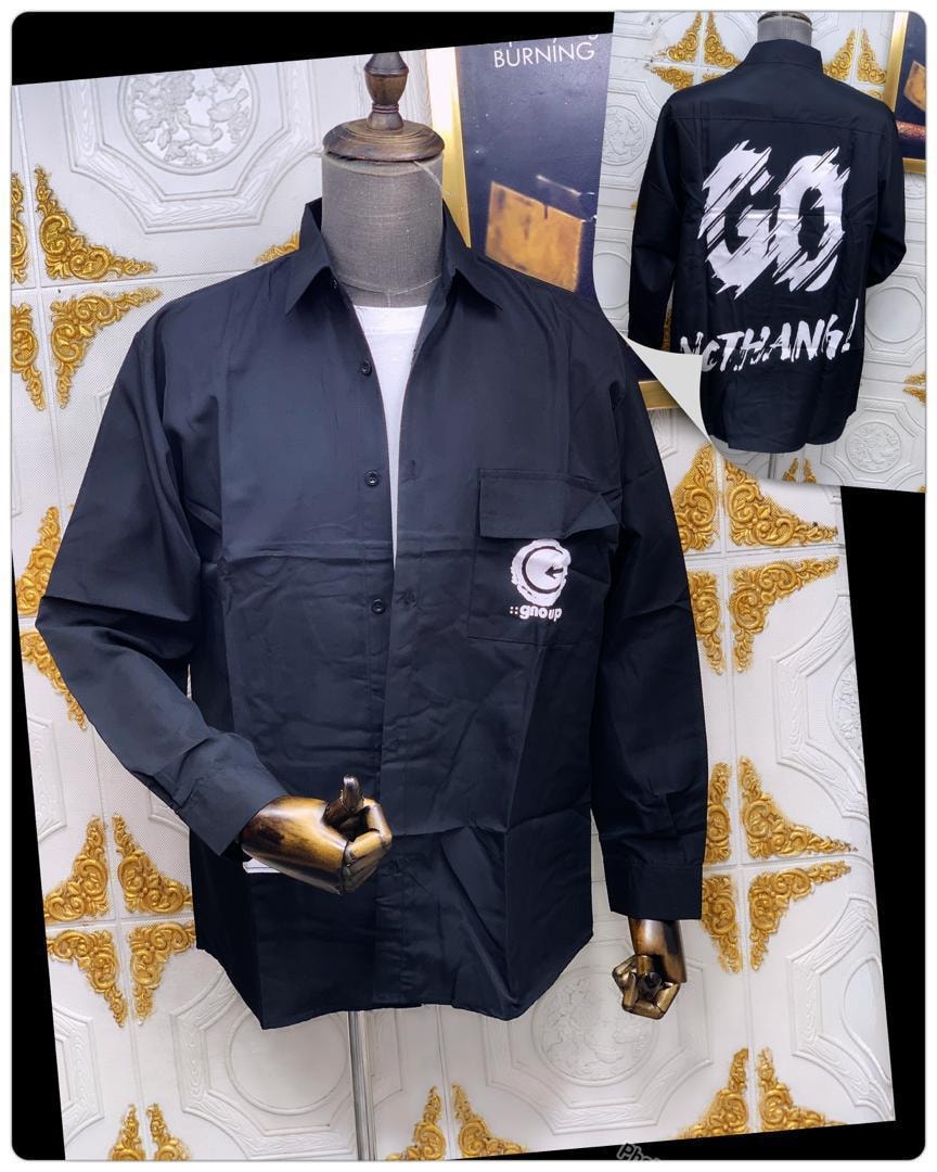 Black GO NOTHING graphic button-down shirt on mannequin showing front pocket and back view inset.