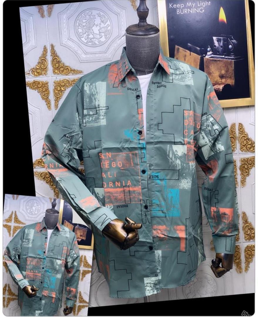 Green abstract collage print button-down shirt displayed on mannequin.
