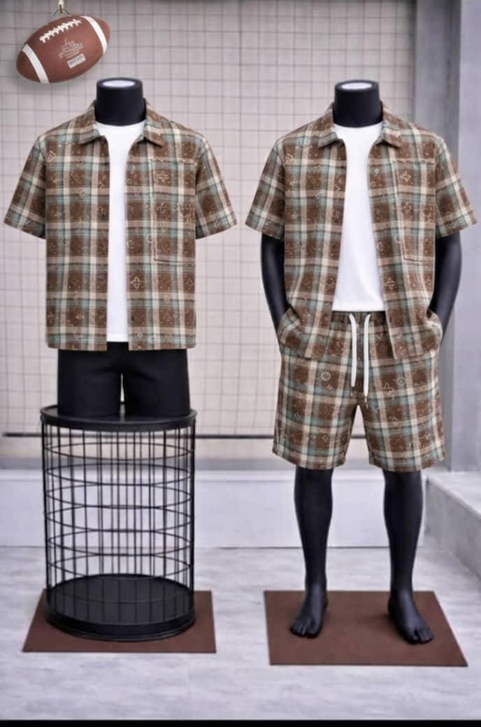 Brown plaid short sleeve shirt and matching shorts two-piece set on mannequins.