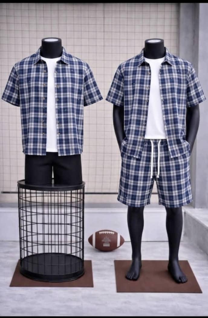 Blue plaid short sleeve shirt and matching shorts two-piece set on mannequins.
