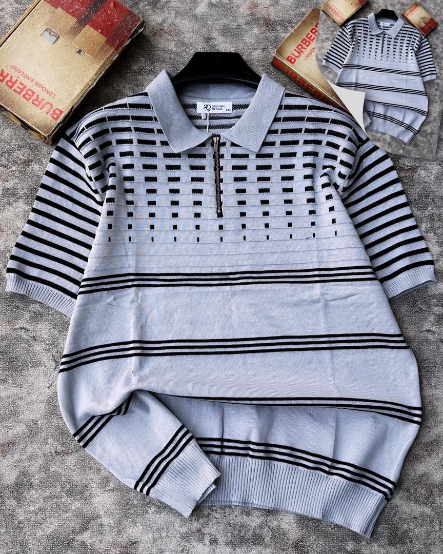 Light gray and black striped grid knit quarter-zip sweater with detailed openwork design.