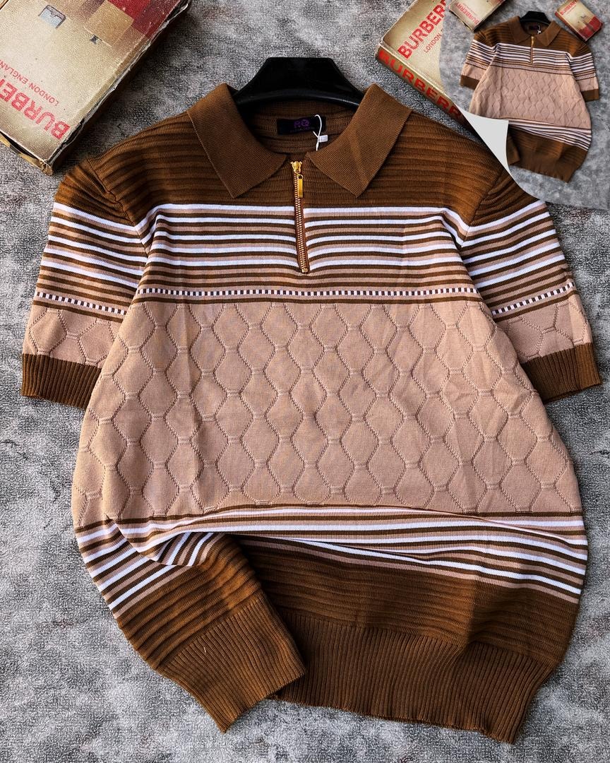Brown and beige striped diamond knit quarter-zip sweater displayed with ribbed collar and cuffs.