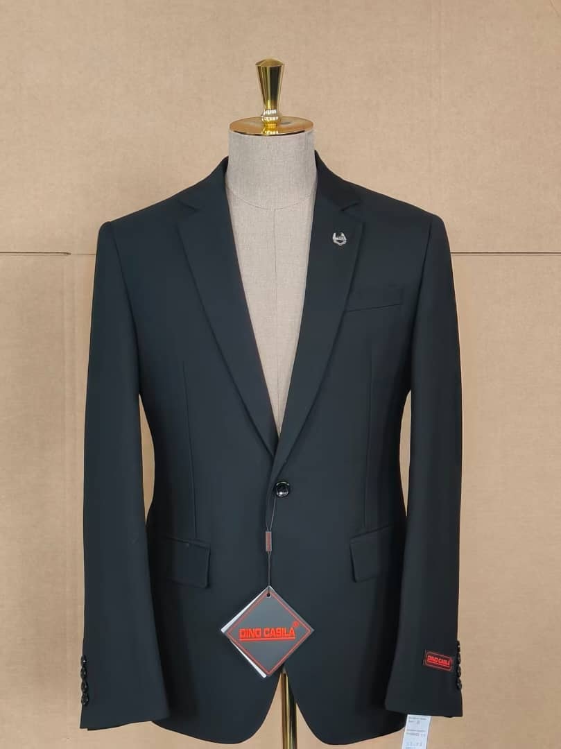 Black single breasted suit jacket on mannequin with visible tags.