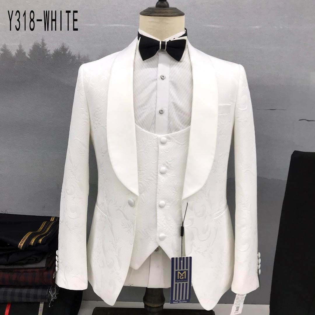 White patterned tuxedo suit with shawl lapels and vest on mannequin.