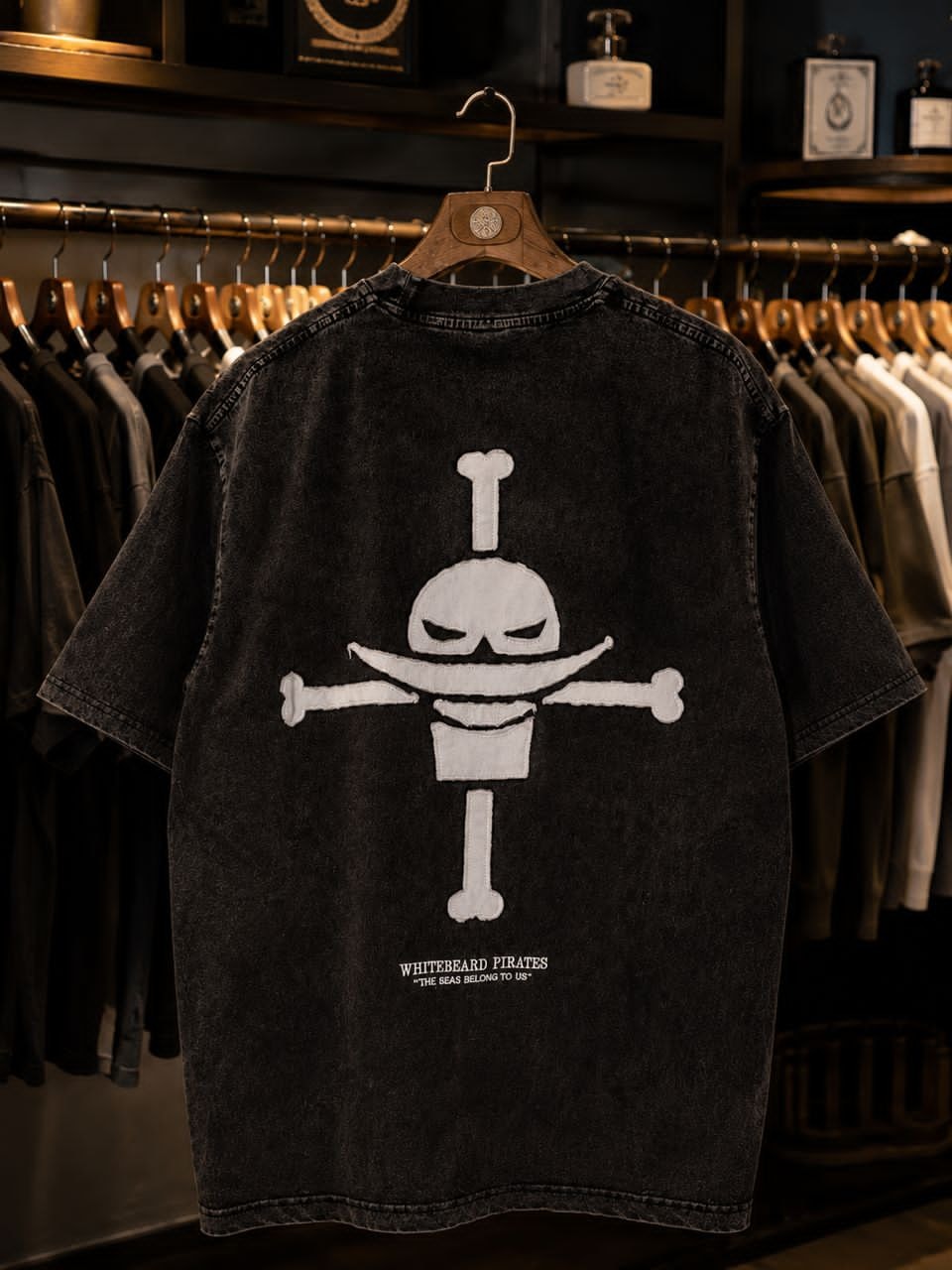 Back view of black washed t-shirt with white Whitebeard Pirates skull print.
