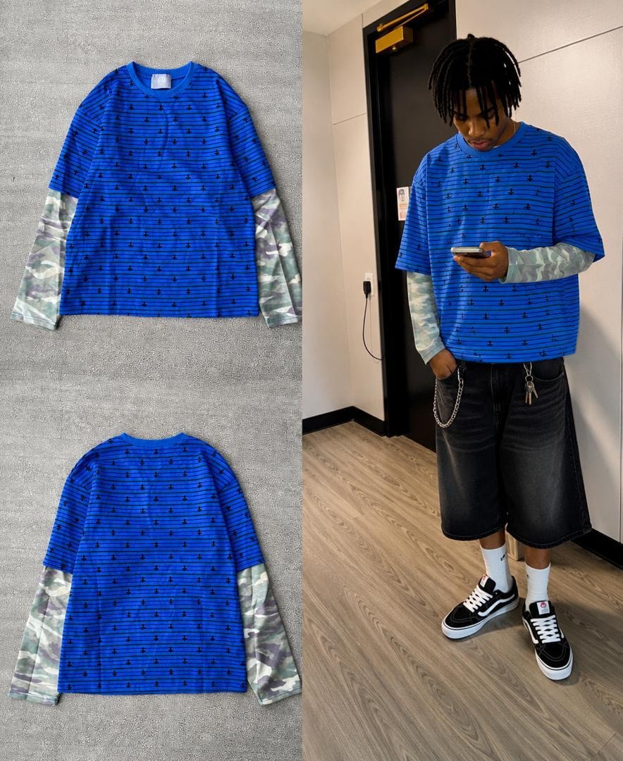 Blue striped anchor long sleeve t-shirt with camo sleeves in flat lay and on model.