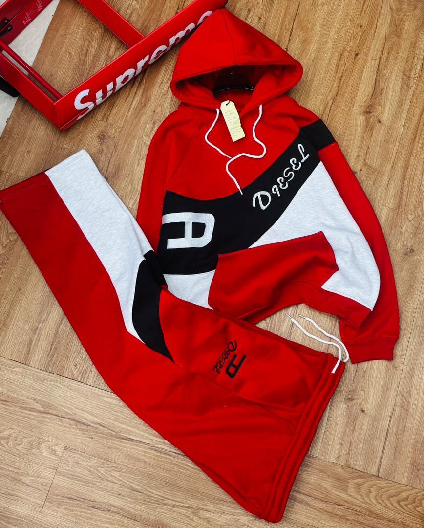 Red Diesel colorblock hoodie and matching jogger pants with white and black panels.