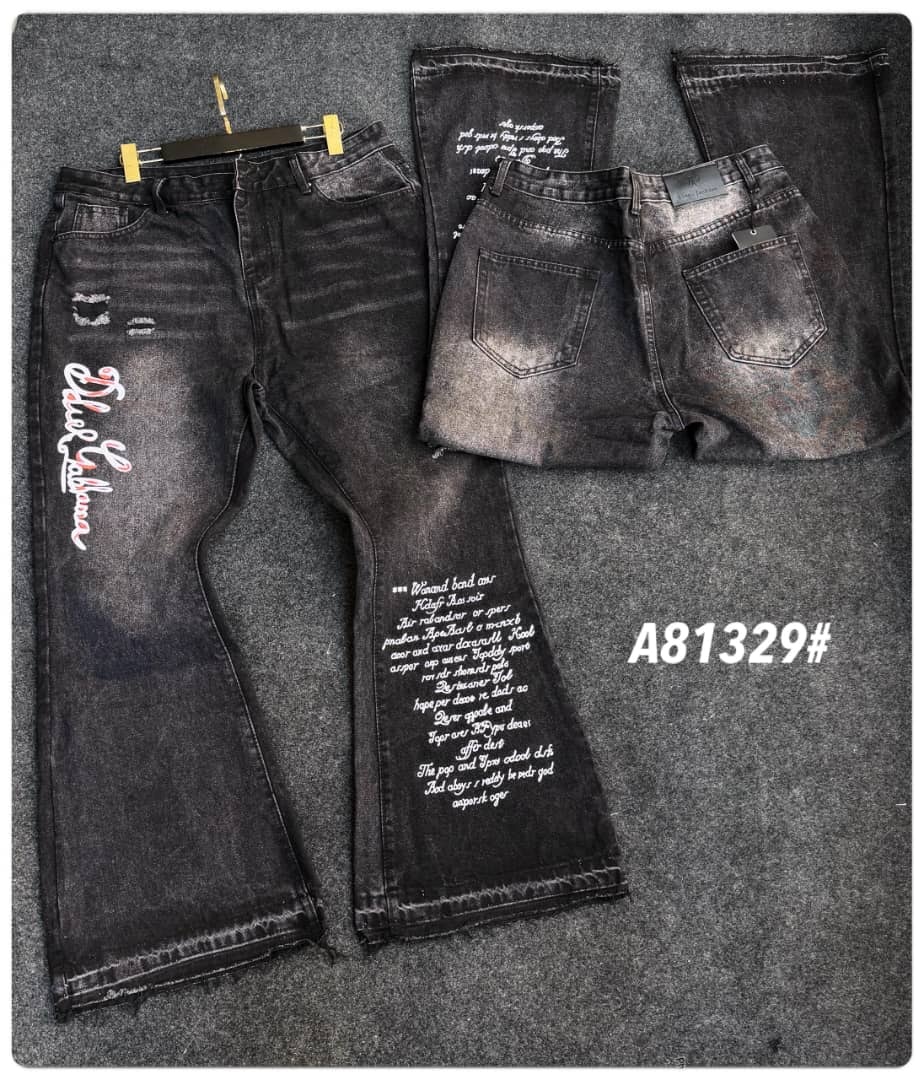 Dark gray baggy jeans with white text prints on legs and back, front and back views.
