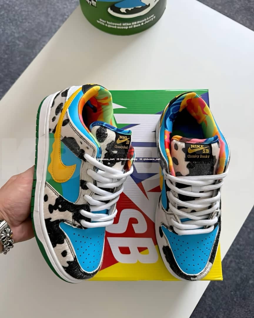 Nike SB Dunk Low Chunky Dunky with colorful cow print and mixed bright panels on green and yellow box.