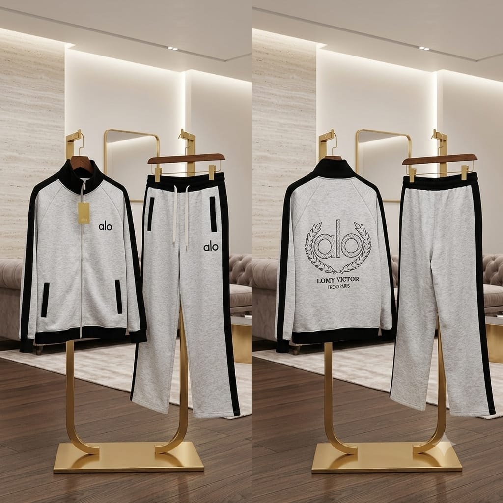 Gray track suit set with black contrast panels displayed in front and back views.