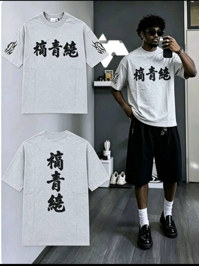 Gray oversized t-shirt with Chinese characters, sleeve flames and model views.