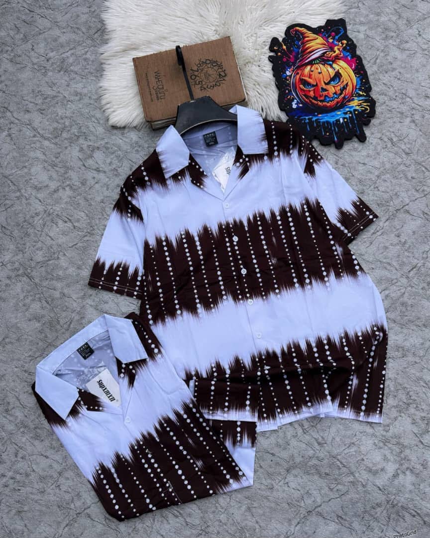 Short sleeve shirt with white and brown tie-dye dot and line pattern.