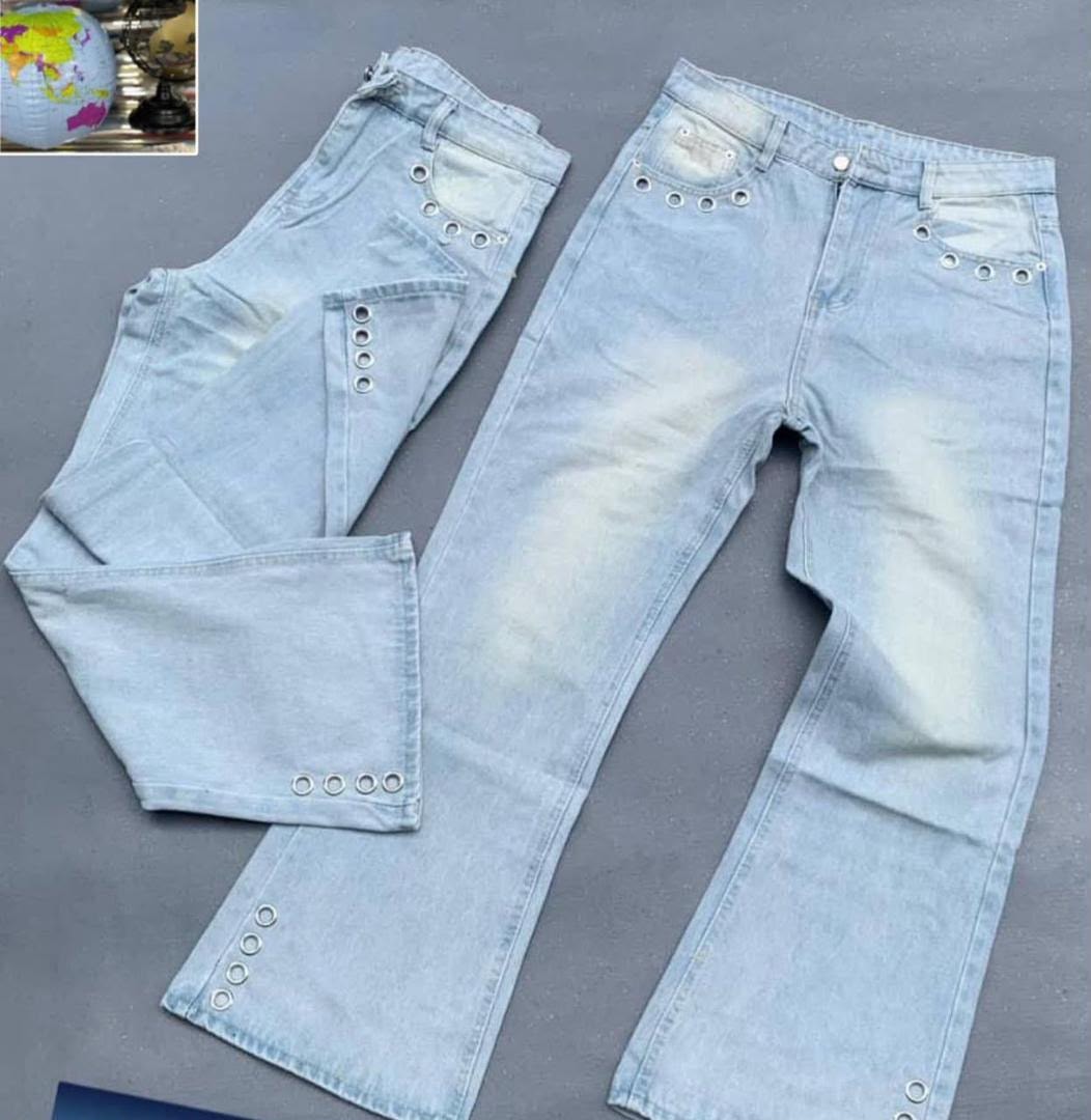 Light blue flared jeans from multiple angles displaying silver grommets on waist, pockets and legs.