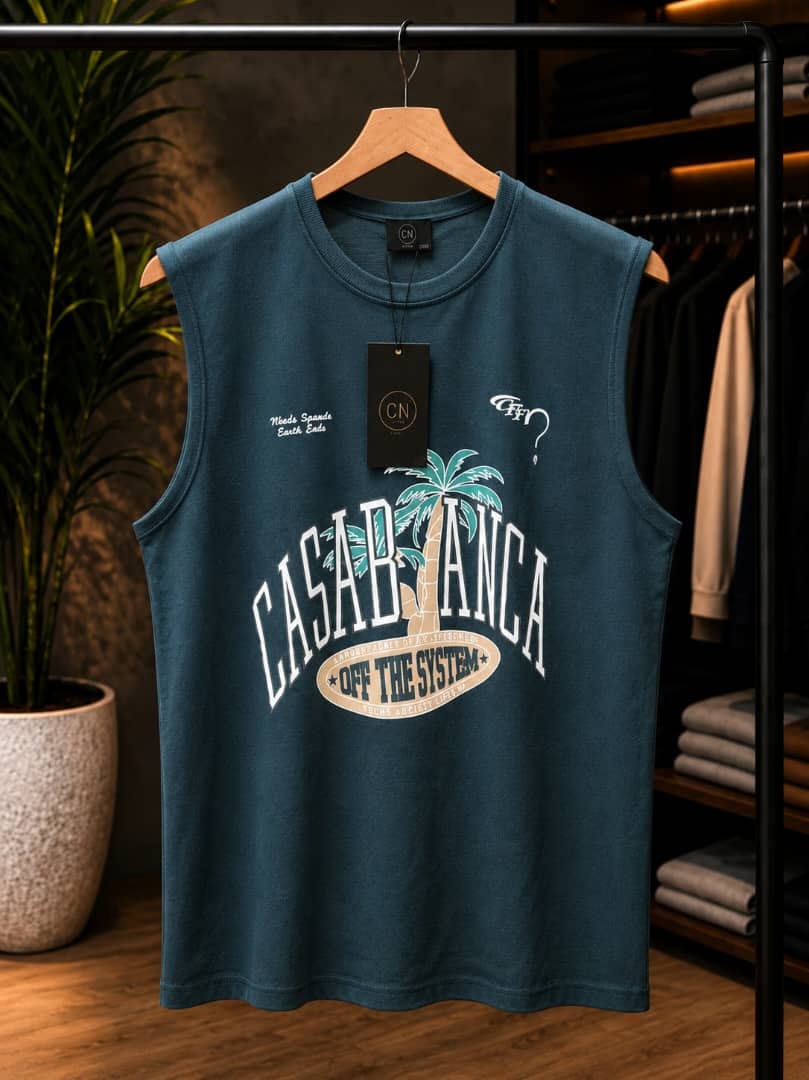 Teal sleeveless top with large Casablanca Off The System palm tree graphic on the chest.