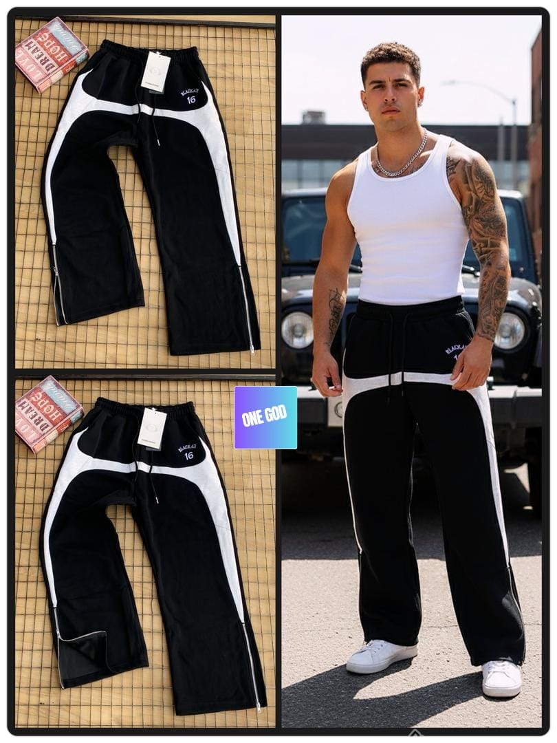 Black joggers with white contrast panels and logo shown in flat lay and worn by model.