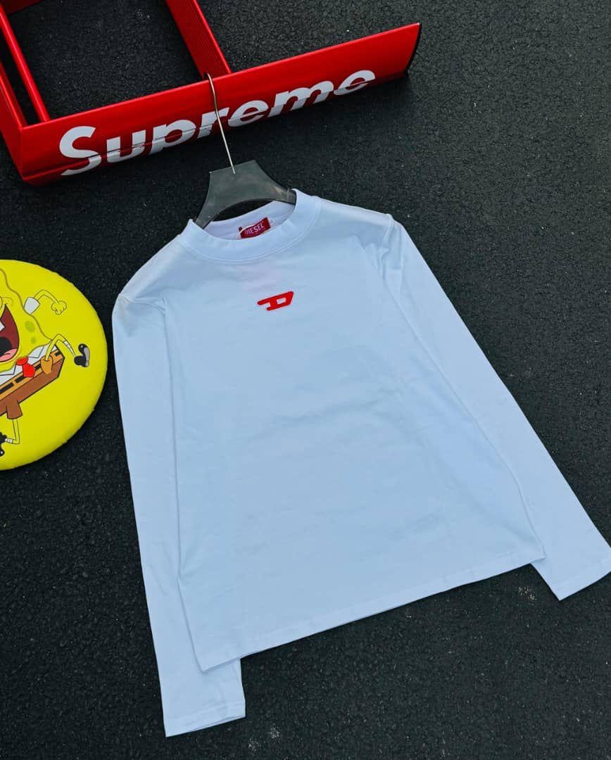 White Diesel long sleeve t-shirt with red D logo on chest, shown on hanger.