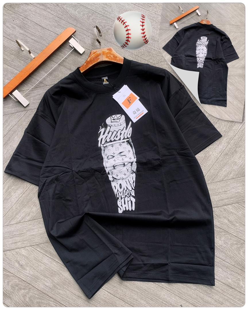 Black tee with Hustle money face graphic, back view shown.