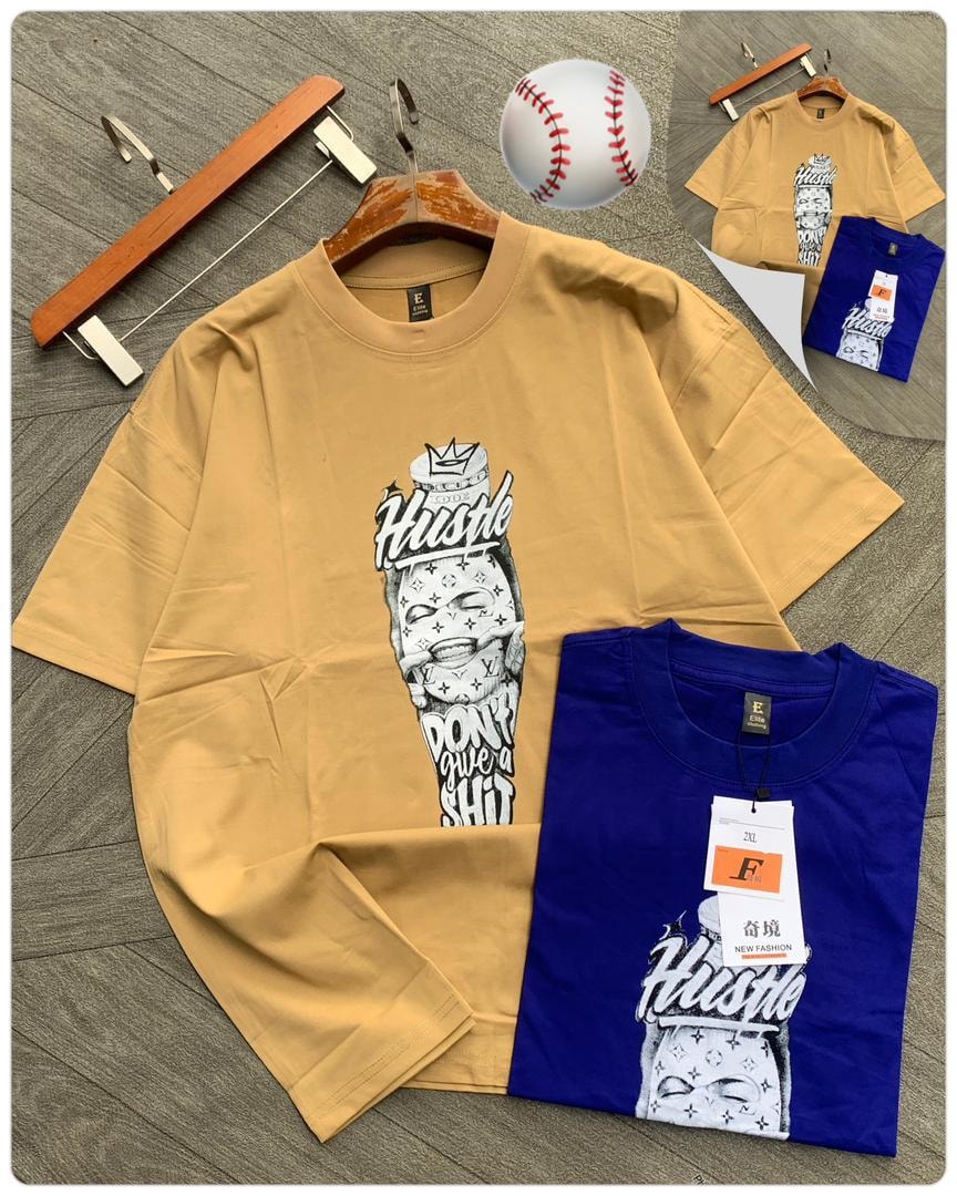 Tan and blue tees with Hustle money face graphic.