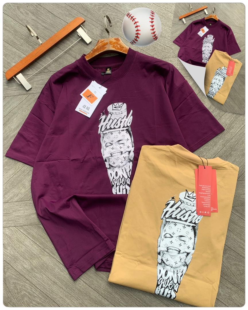 Purple and yellow tees with Hustle money face graphic.