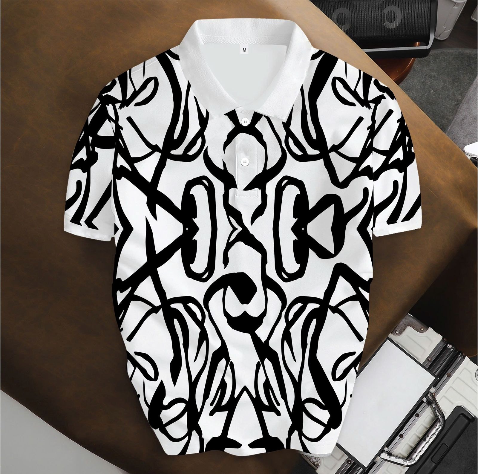 White unisex polo shirt with bold black abstract line pattern, flat lay.
