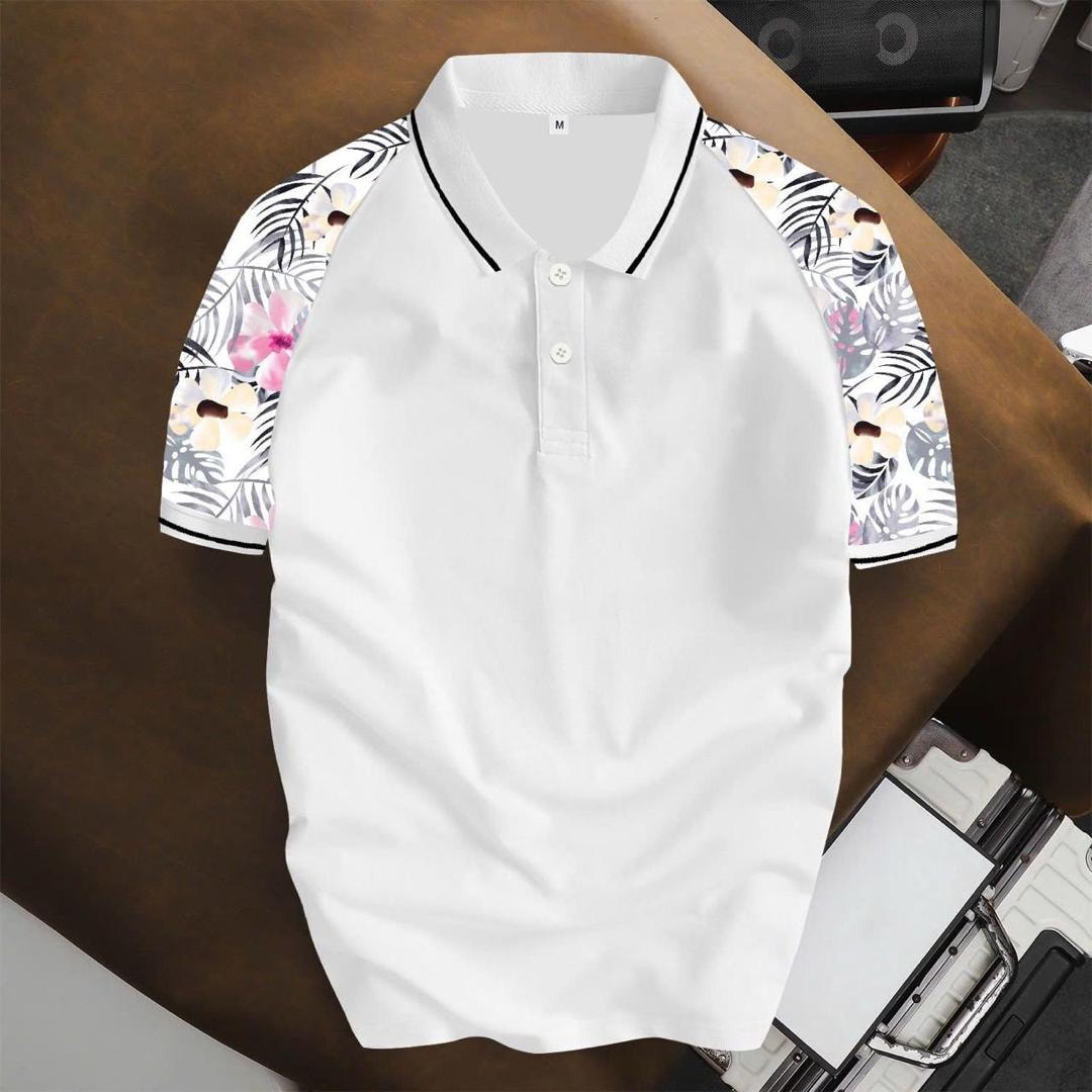 White unisex polo shirt with floral and leaf prints on sleeves, flat lay view.