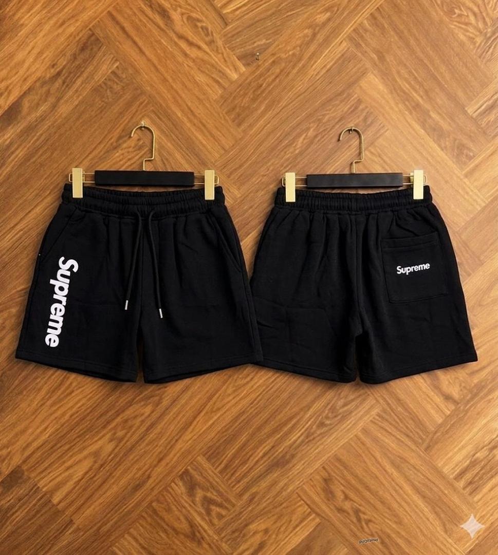 Black Supreme fleece shorts shown from front and back views.