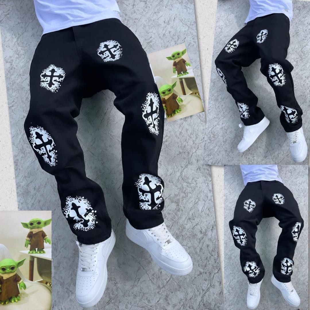 Multiple angles of model in black jeans with white cross and splatter prints, including close-up details.