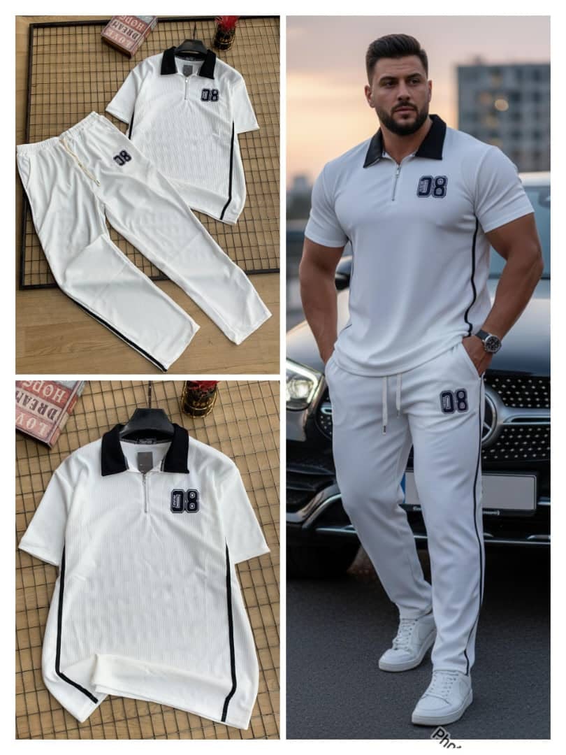 White unisex ribbed polo two-piece set shown on model and in flat lay.