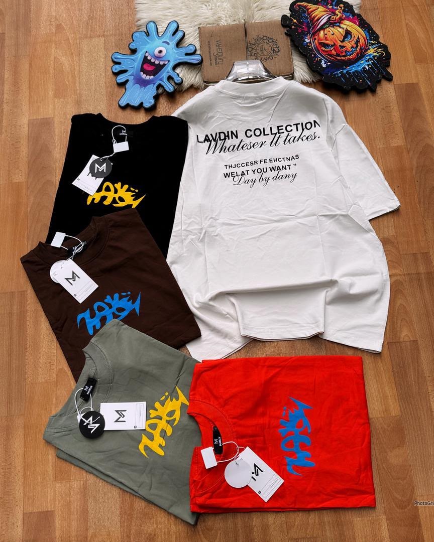 Group of five oversized graphic tees in black, brown, white, gray and red, showing front prints and white back text design.