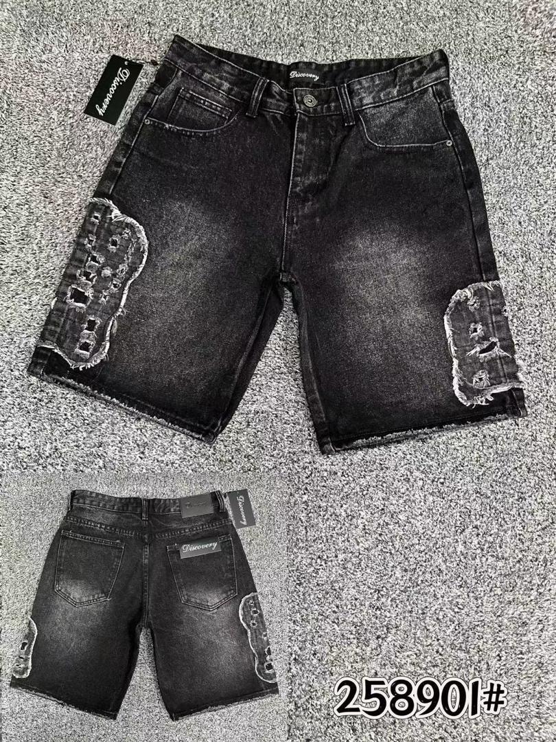 Front and back views of black Discovery denim shorts with large distressed patches on thighs.