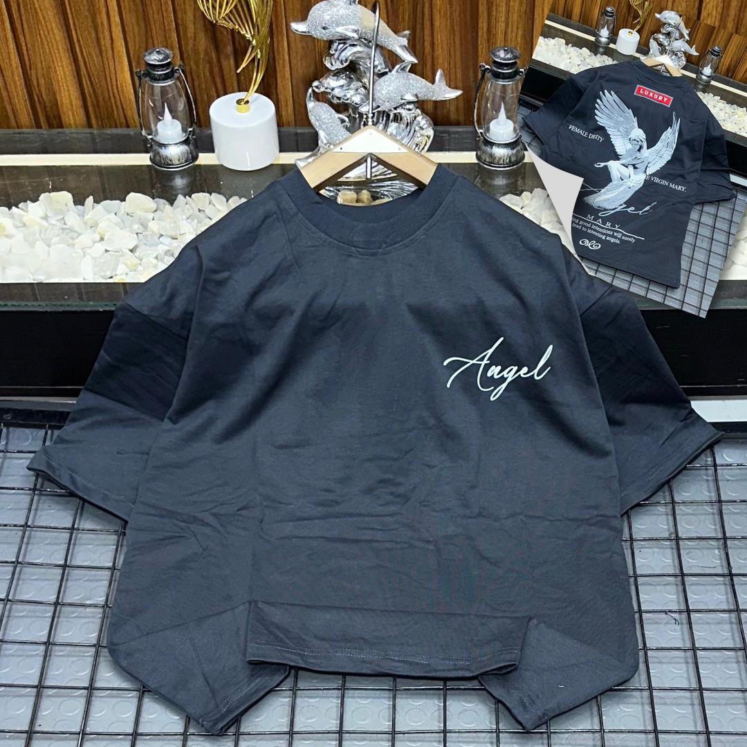 Gray oversized t-shirt with white 'Angel' script on chest and detailed angel graphic on back inset.