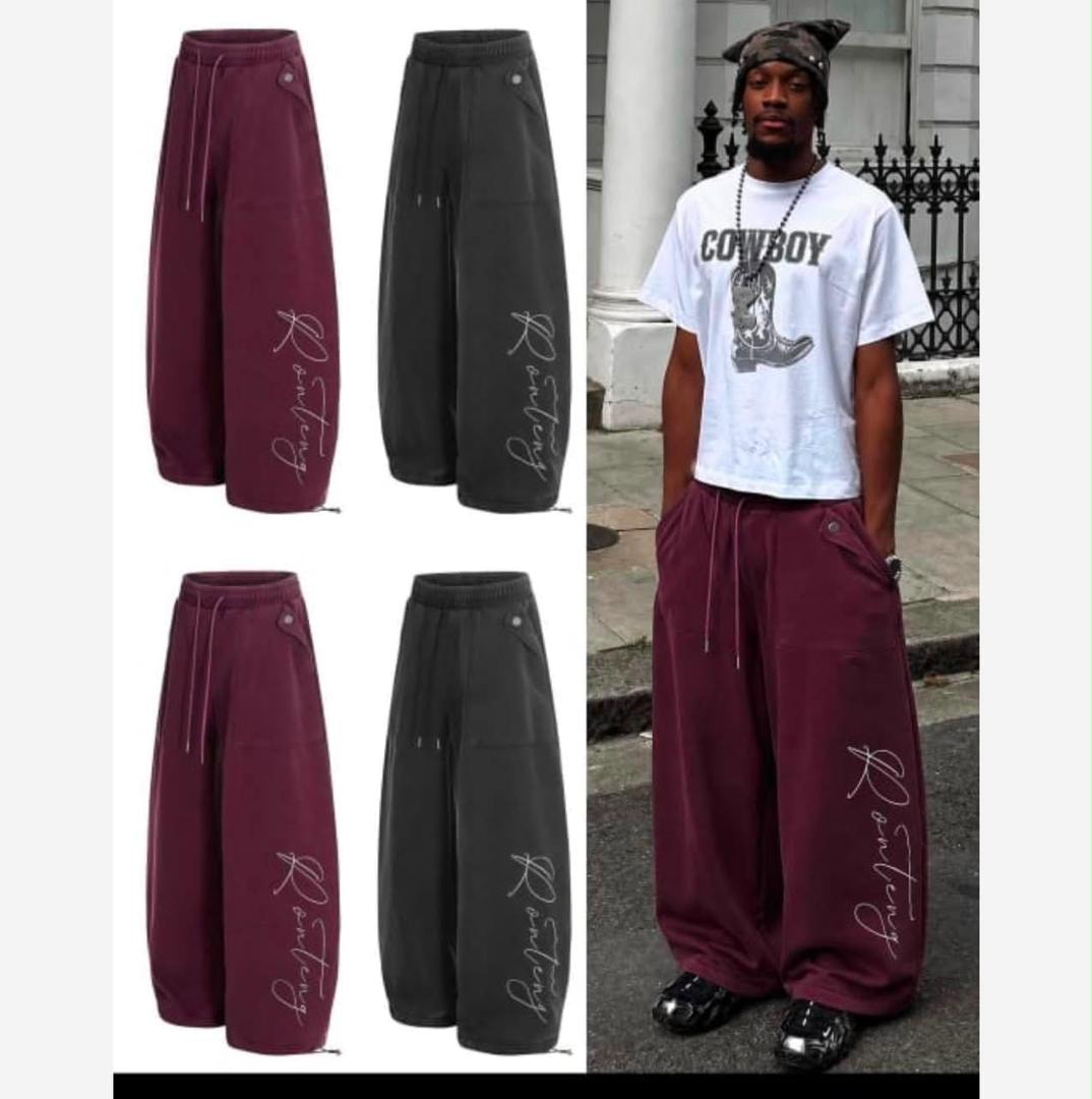 Burgundy and gray baggy wide-leg joggers displayed side-by-side with model wearing burgundy pair.