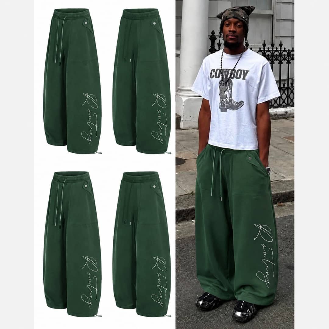 Green baggy wide-leg joggers with white script embroidery shown in multiple flat views and on model.