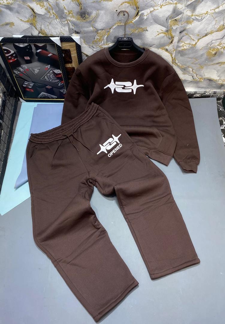 Brown crewneck sweatshirt and joggers with white symbol logo.