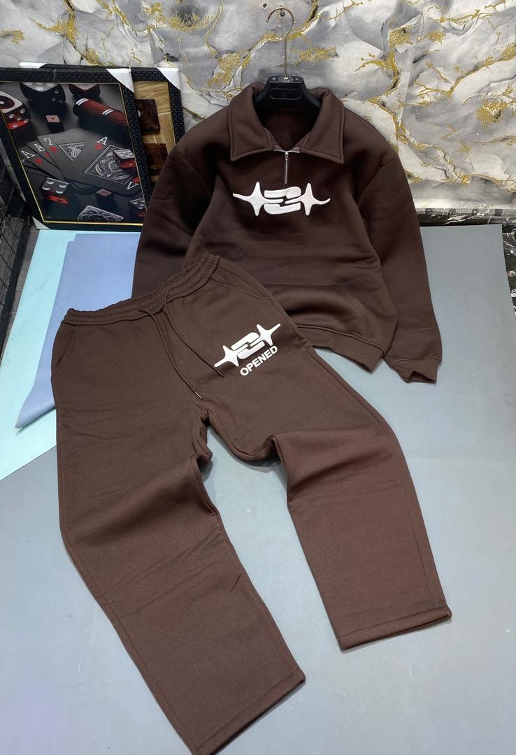 Brown quarter-zip hoodie and joggers with white symbol logo.