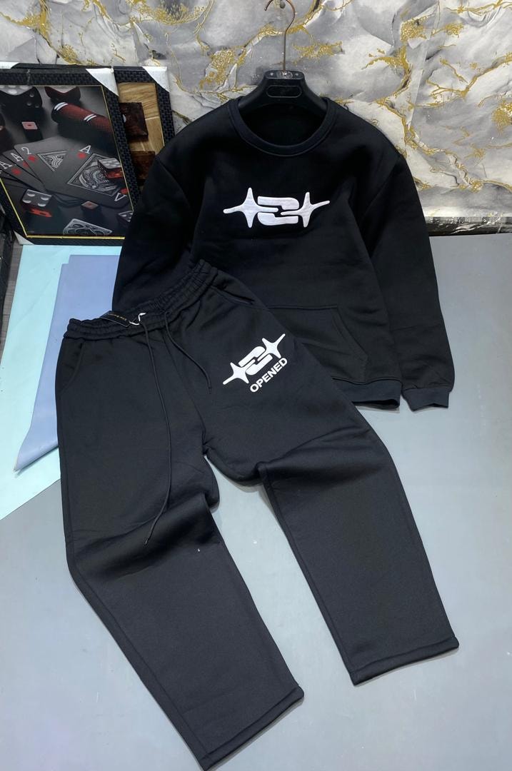 Black crewneck sweatshirt and joggers with white symbol logo.