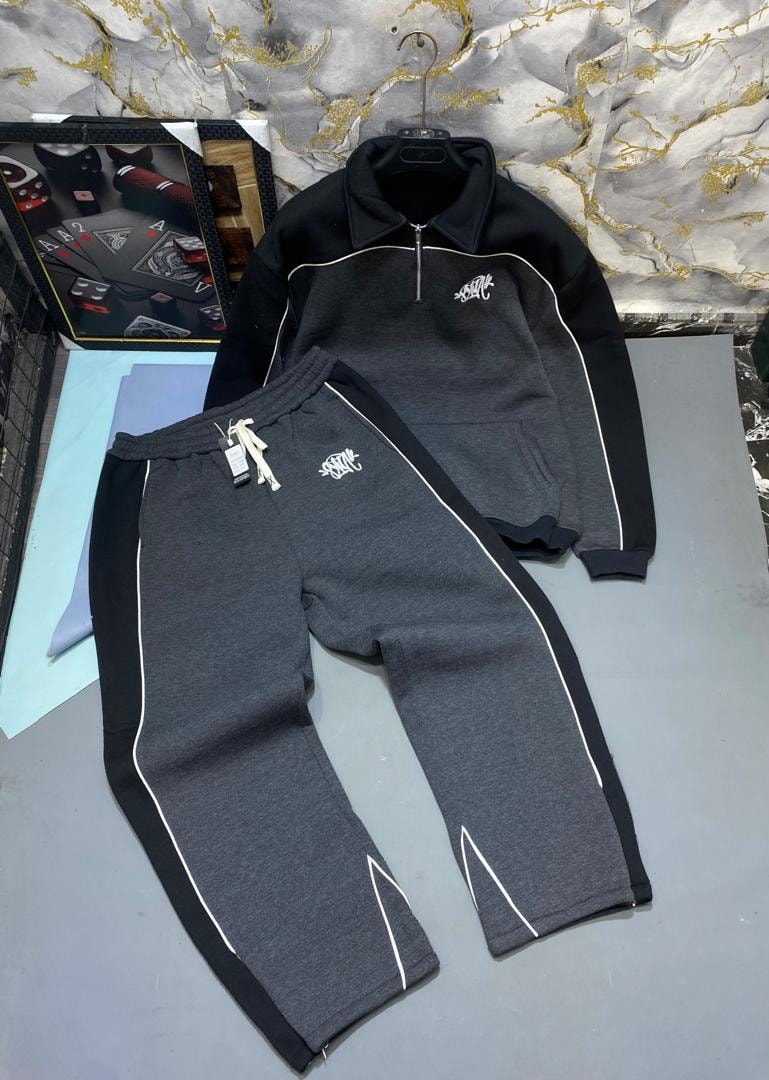Gray and black quarter-zip collared sweatshirt with matching joggers and white piping.