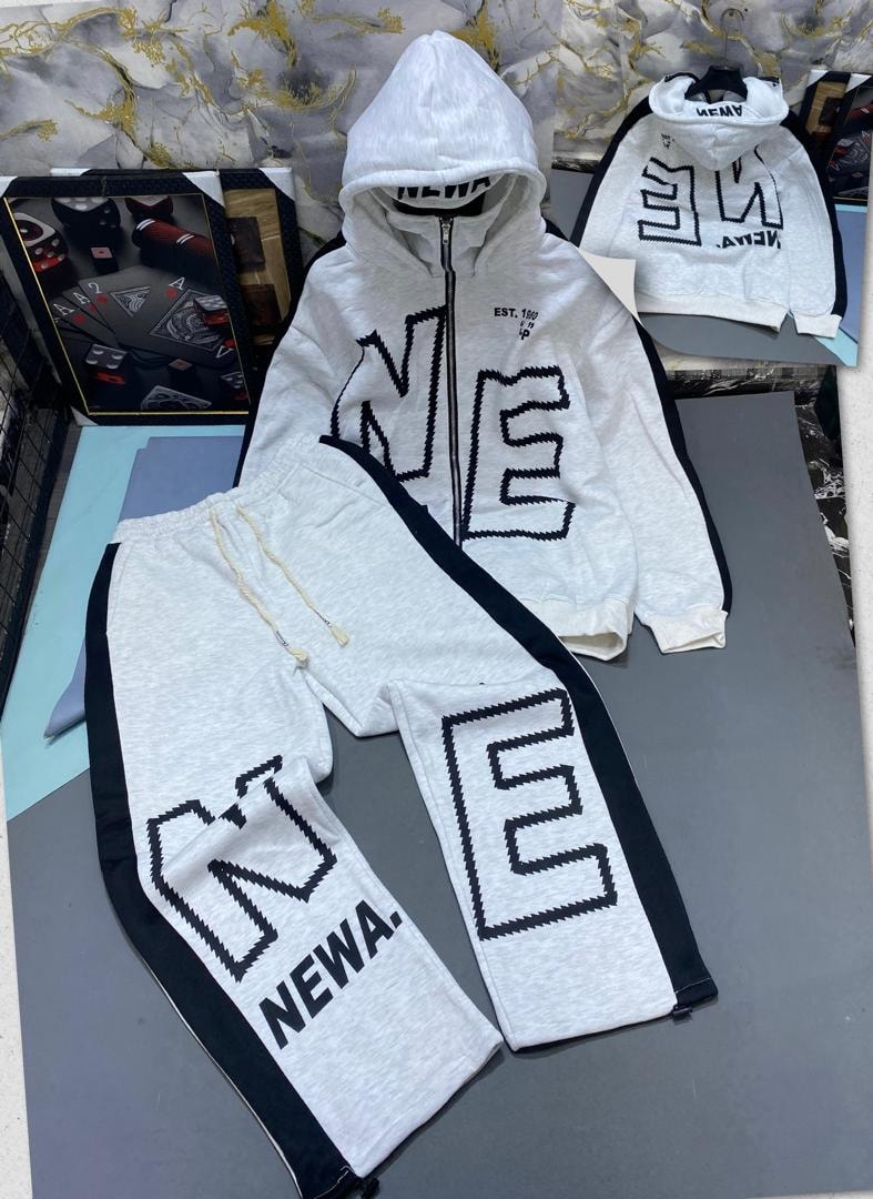 White zip hoodie and jogger set with black NEWA graphic prints.